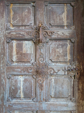 Old wooden door of the pilgrimage Church Maria Strassengel, a 14th century Gothic church in the town Judendorf Strassengel near Graz, Styria region, Austriaの写真素材