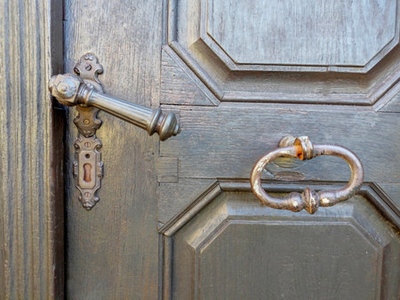 Detail of a beautiful old wooden door of Church Maria Strassengel, a 14th century Gothic pilgrimage church in the town of Judendorf Strassengel near Graz, Styria region, Austriaの写真素材