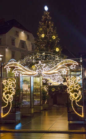 Beautiful Christmas decorations at famous main square Hauptplatz, at night, in the city center of Graz, Steiermark, Austria.の写真素材