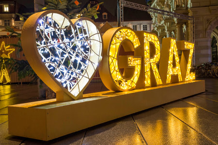 Beautiful Christmas decorations at famous main square Hauptplatz, at night, in the city center of Graz, Steiermark, Austria.の写真素材