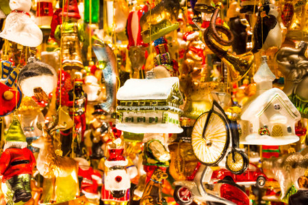 Graz, Austria-December 02, 2021: Christmas glass decorations for sale on a shop window, decorative hand painted Christmas balls on advent market. Close up, selective focusのeditorial素材