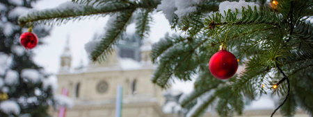 Christmas tree detail and Town Hall building at famous main square Hauptplatz , in winter, in the city center of Graz, Steiermark region, Austria. Selective focusの写真素材