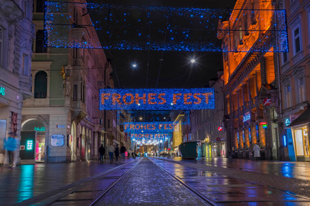 Graz, Austria-December 02, 2021: Beautiful Christmas decorations and lights on famous Herrengasse street, at night, in the city center of Graz, Steiermark, Austria. Selective focusのeditorial素材