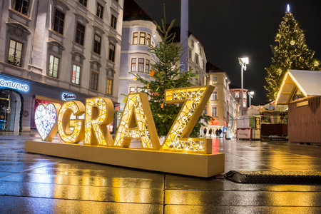 Graz, Austria-December 02, 2021: Beautiful Christmas decorations at famous main square Hauptplatz, at night, in the city center of Graz, Steiermark, Austria.のeditorial素材