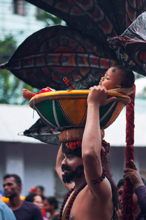 people and children dressed as radha krishna at hindu festivalのeditorial素材