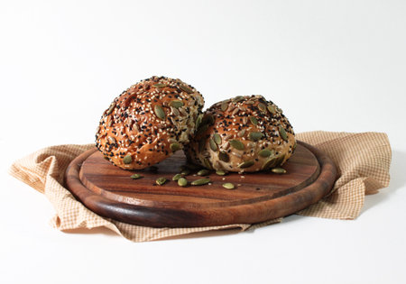 Multi grain bun on wooden tray
