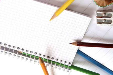 Close-up of color pencils and agendaの写真素材