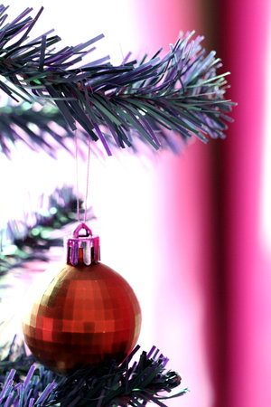Close up of Christmas ornaments on tree.の写真素材