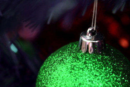 Close up of Christmas ornaments on tree.の写真素材