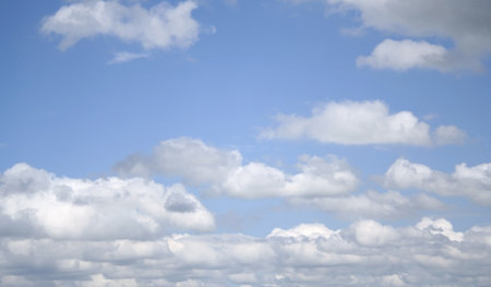 White clouds in a blue sky.
