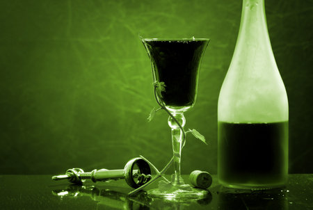 red wine glass and bottle