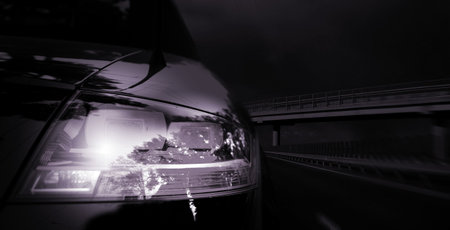 Black car on the highwayの写真素材