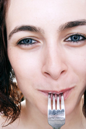 Beauty woman waiting for dinnerの写真素材