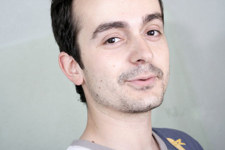 Portrait of a happy young guy .の写真素材