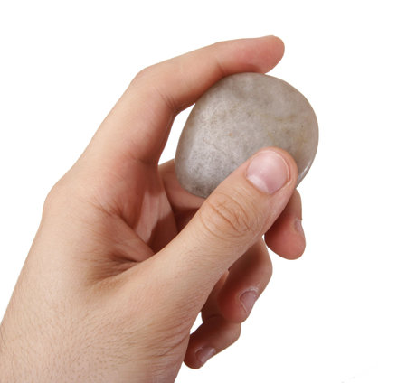 Man holding some pieces of rocks. Isolate on white.の写真素材