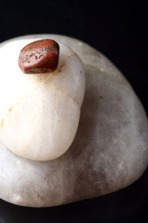 Concept made by many rocks isolated on black.の写真素材