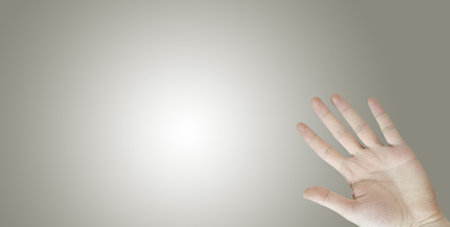 A man hand ask for help. Isolated on background.の写真素材