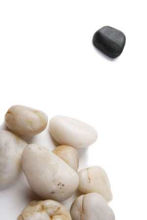 Groups concept made of many rocks isolated on white.の写真素材