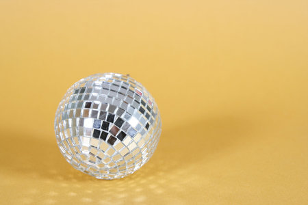 christmas ball isolated on yellow background.の写真素材