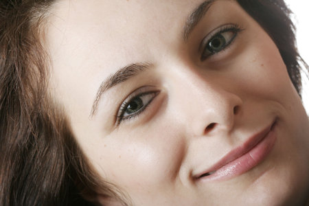 Beautiful happy woman with green eyes.の写真素材