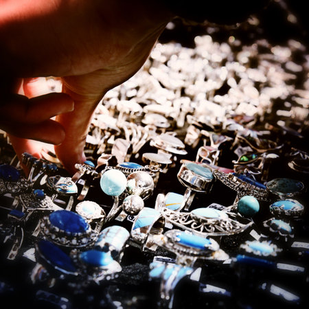 Silver jewelery: chains, rings, medallion and earrings.の写真素材