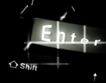 Close-up picture of a computer keyboard - blue key enterの写真素材