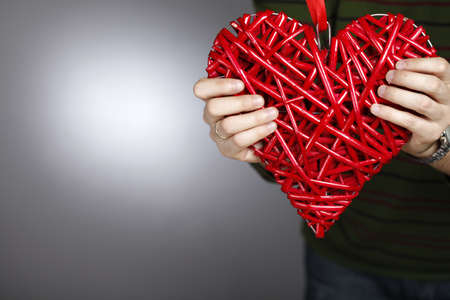 Hand made red heart - symbol of love