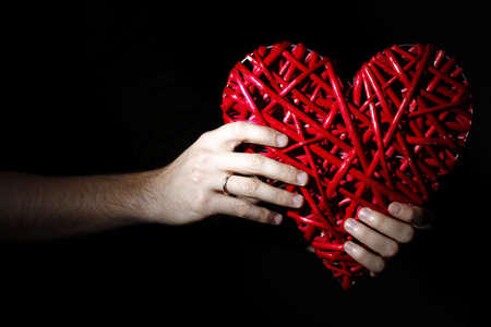 Hand made red heart - symbol of loveの写真素材