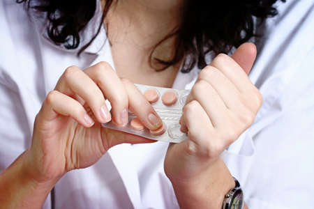 Professional young doctor at work. Close up.