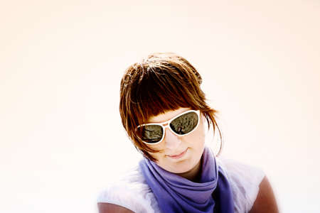 Beautiful woman with white glases.の写真素材