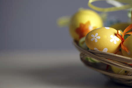 Close up of many Easter eggs in a bascketの写真素材
