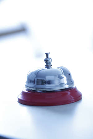 Close up photo of a bell in a hotel