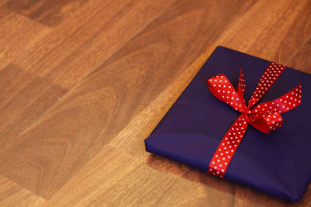 Close up photo of a small mauve present