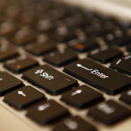 Close up photo of a gray laptop keyboard
