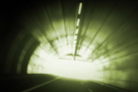Car lights trails in a tunnelの写真素材