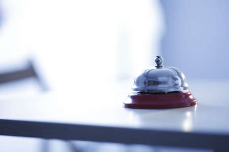 Close up photo of a bell in a hotelの写真素材