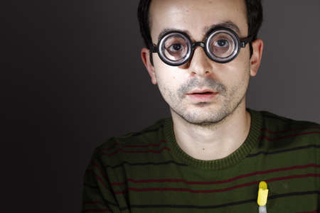 Portrait of a young man, isolated on background