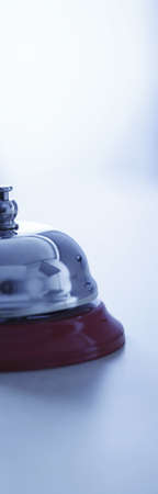Close up photo of a bell in a hotelの写真素材