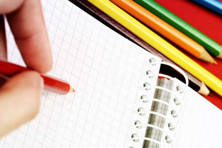 Close-up of pencil and agenda