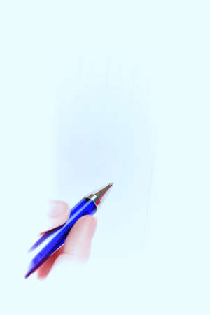 Close-up of woman hand writing in agenda