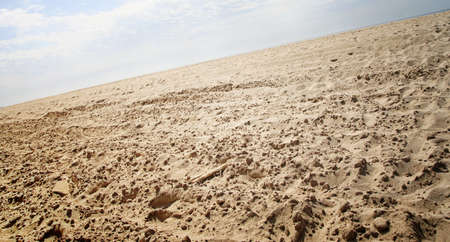 Yellow sand and blue sky.の写真素材