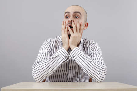 Young businessman at his deskの写真素材