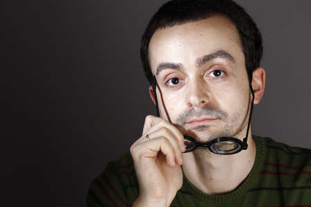 Portrait of a young man, isolated on background