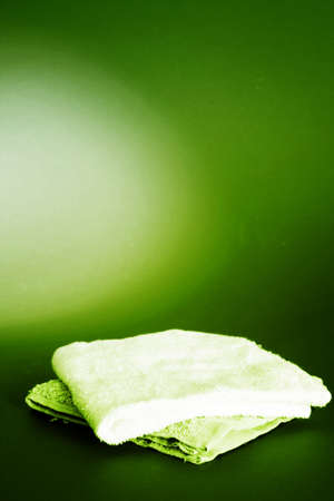 Towels isolated on red backgroundの写真素材