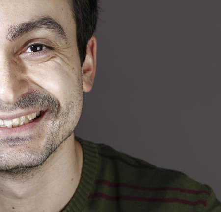 Portrait of a young man, isolated on background