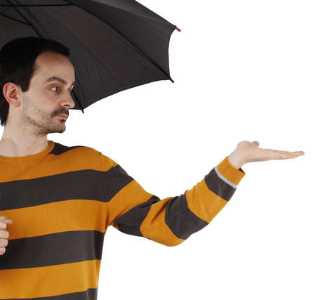 Man with big umbrella, on whiteの写真素材