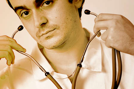Portrait of a young doctor with stethoscope. More of this series on my portfolio !の写真素材