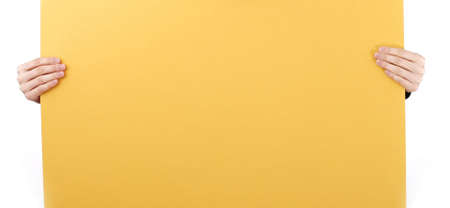 Human hand holding a piece of paper.の写真素材