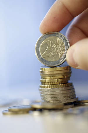 Many money - Towers of euro coinsの写真素材