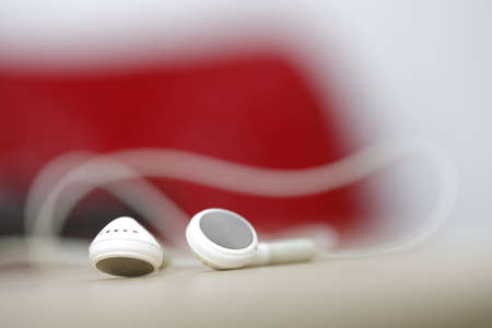 Modern and small mp3 player on a deskの写真素材